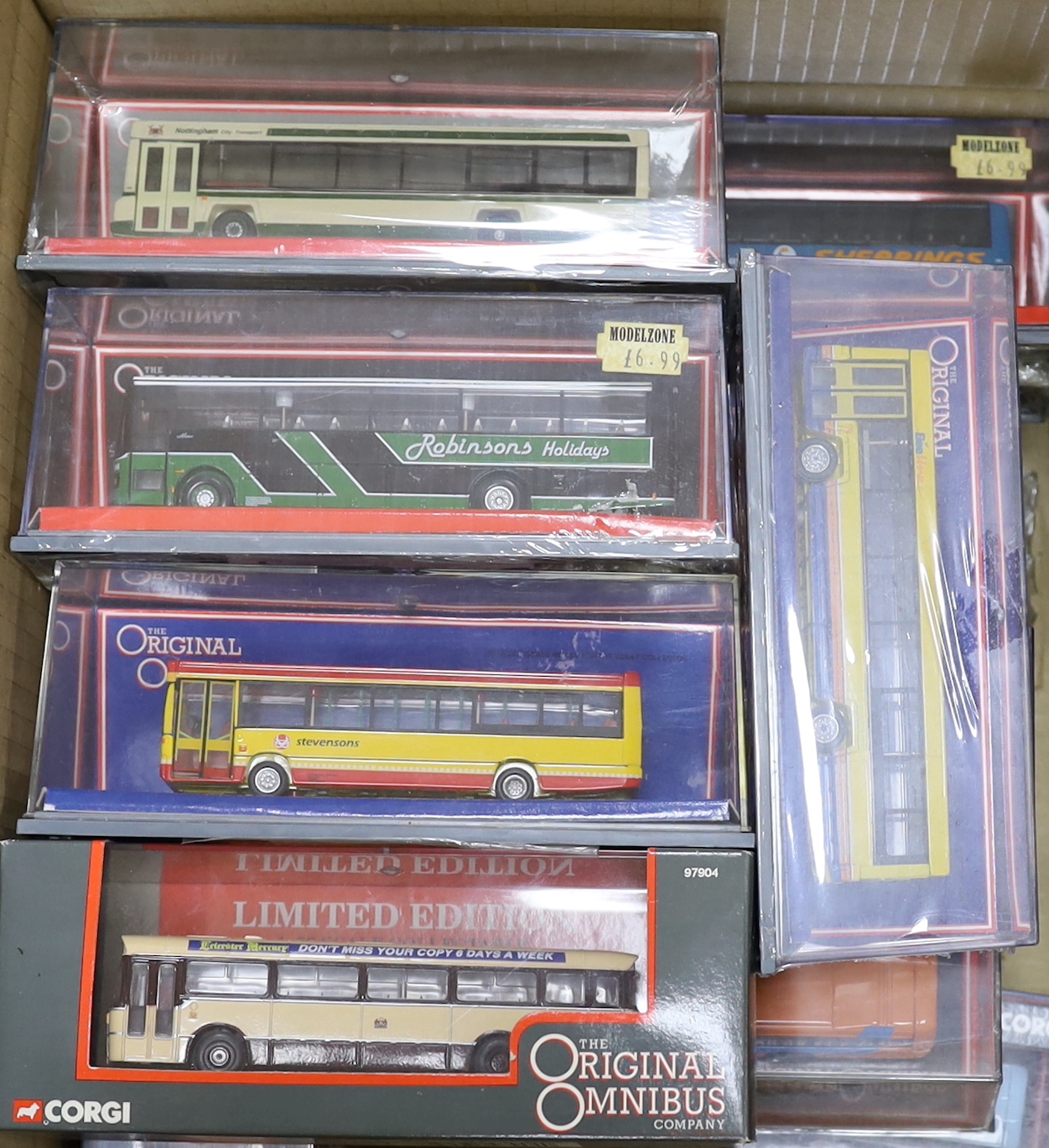 Eighteen boxed Corgi OOC coaches, including an AEC Reliance, a Dennis Dart, a Van Hool Alizee, a Leyland Lynx Mk.II, an Optare Delta, a Plaxton Premiere, etc.